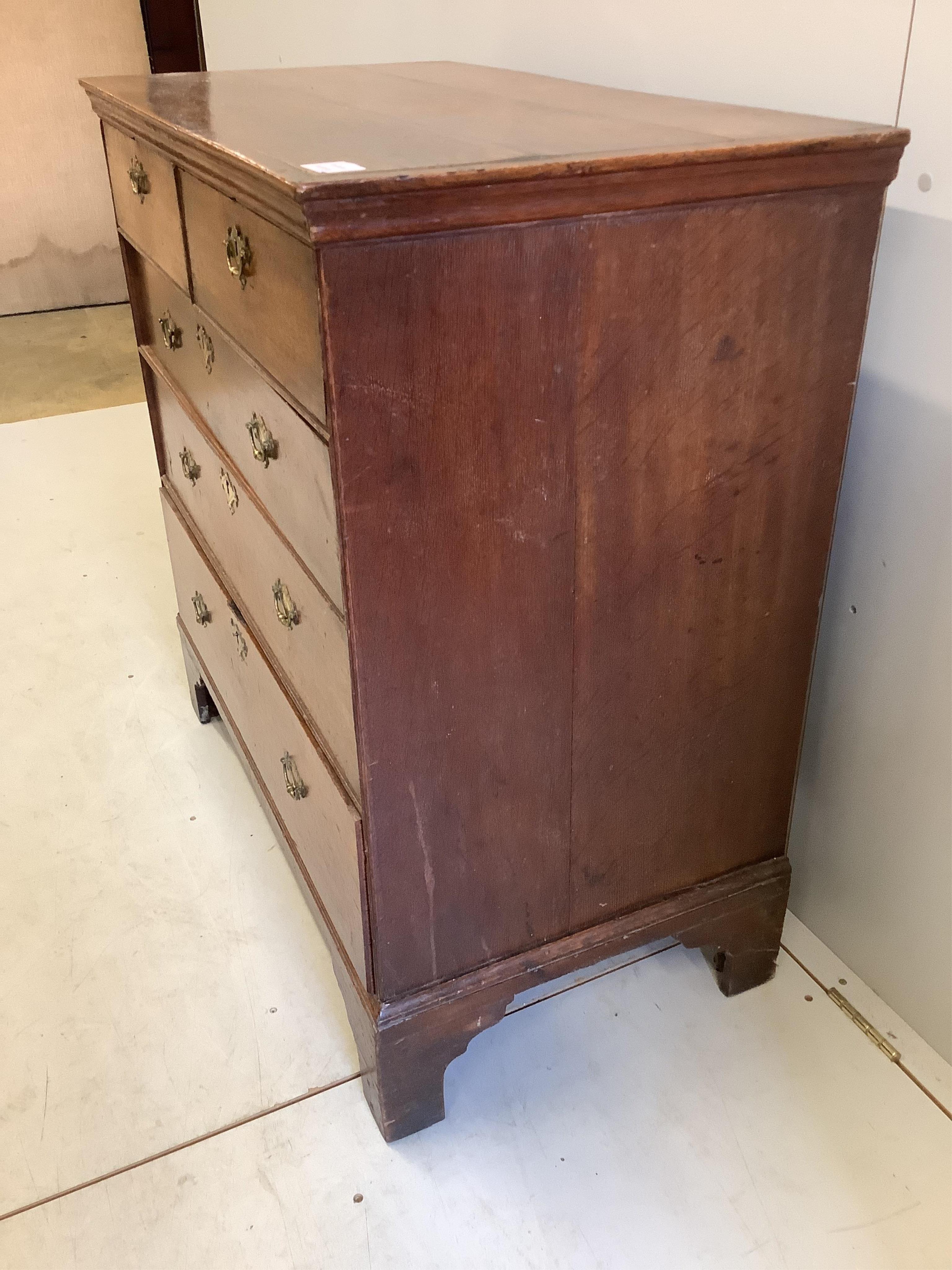 A mid 18th century oak chest, fitted with two short and three long drawers, width 93cm, depth 50cm, height 94cm. Condition - fair